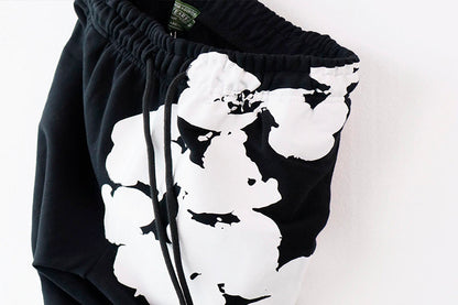 Denim Tears Kapok Flower Pattern Printed Sweatpant DENIM TEARS